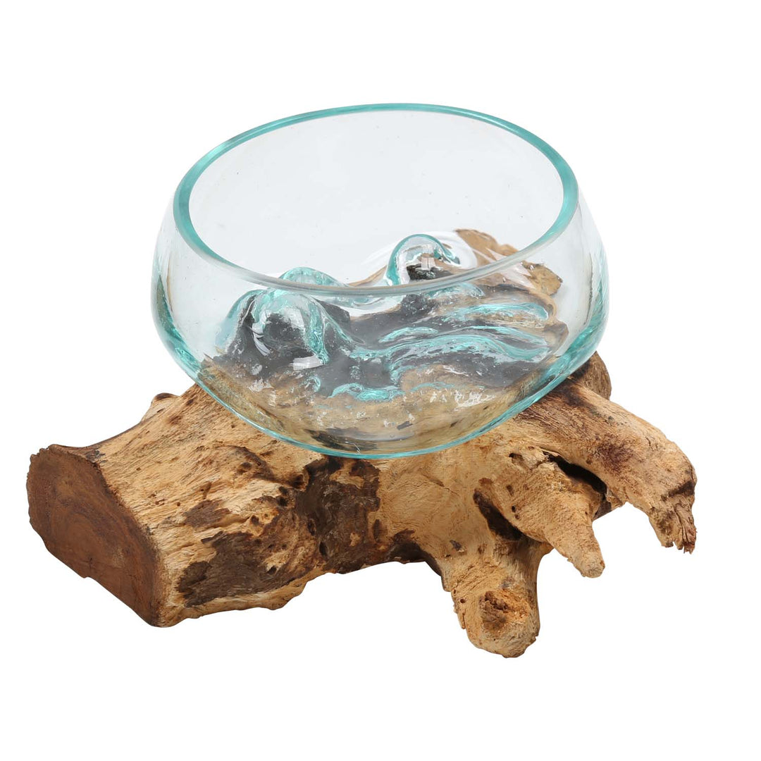 Glass bowl on root wood