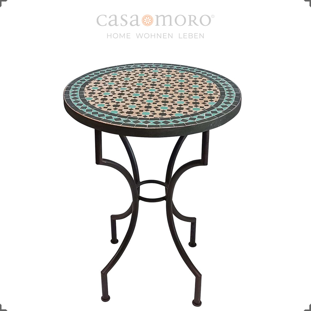 Round mosaic table with a black and turquoise pattern - ideal for the terrace or balcony