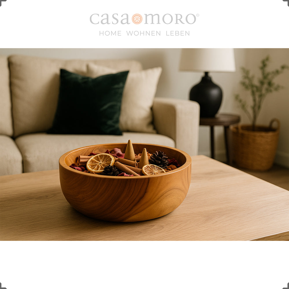 Decorative bowl made of teak wood with natural materials in the living room