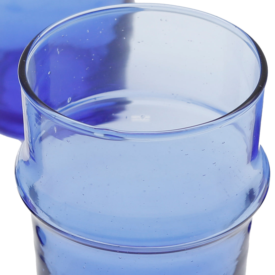 Detailed shot of a single blue glass - perfect as an espresso glass with an elegant mouth rim