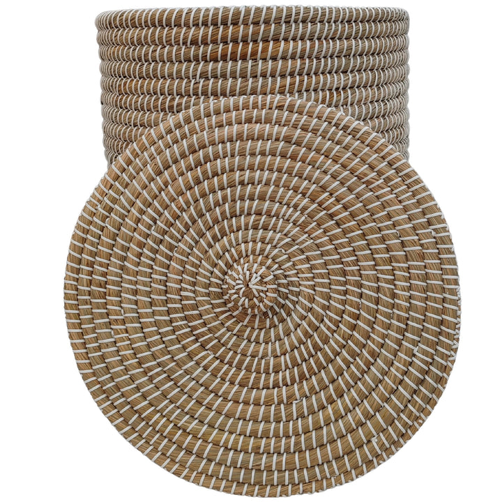 Natural/white seagrass woven basket with a capacity of approximately 65 liters and a visible underside when the lid is removed.