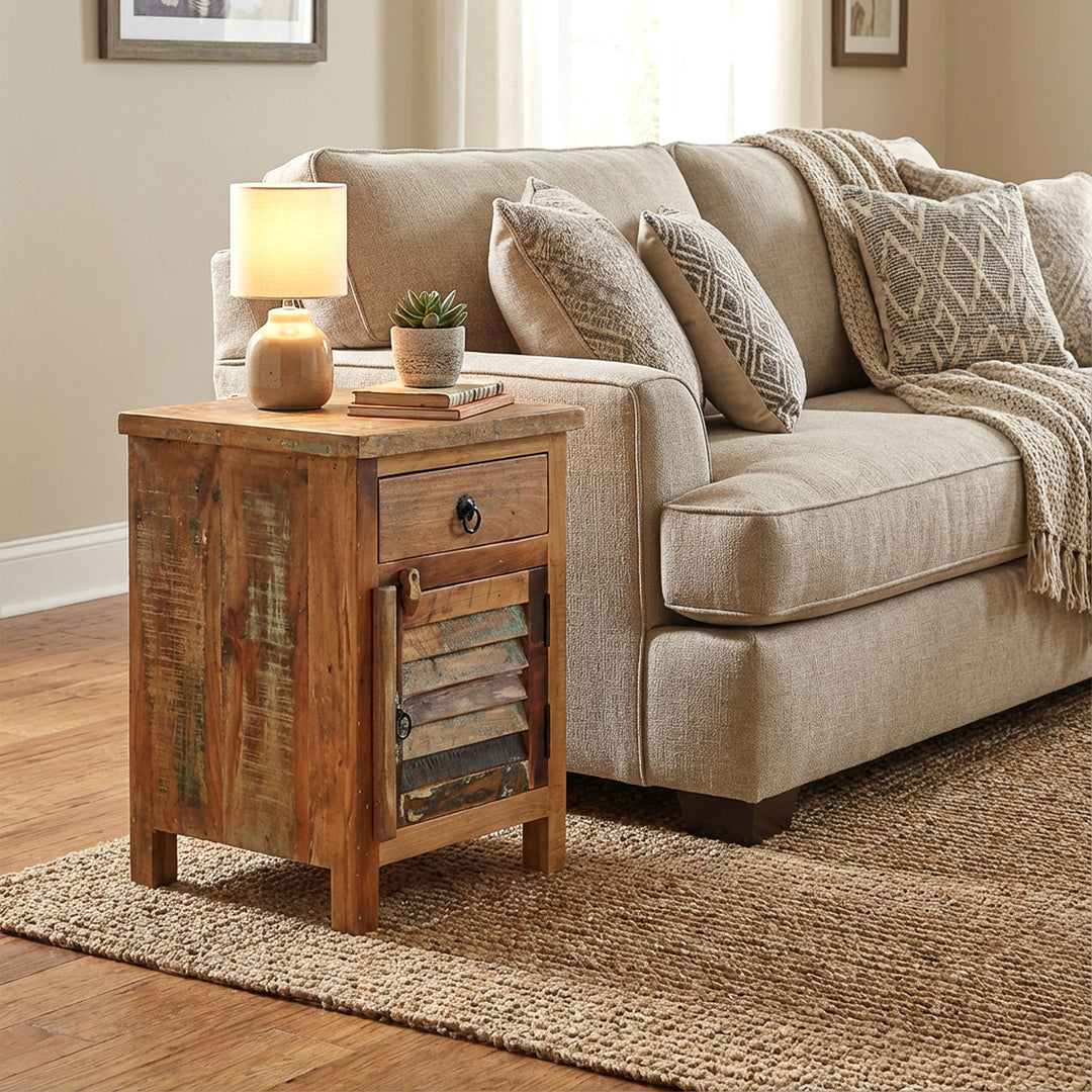 Solid wood chest of drawers as a side table next to the sofa, homely scene with warm light