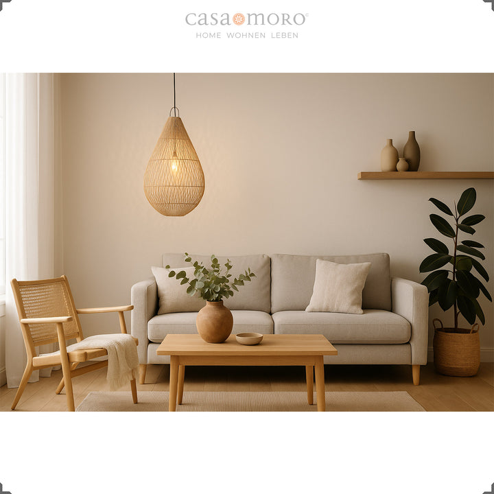 Rattan lamp in teardrop shape as a hanging lamp in the modern living room, with soft light and natural style
