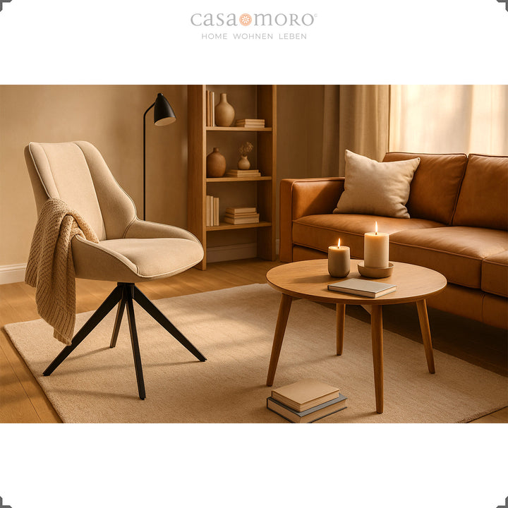 360° rotating dining chair in light brown next to wooden table and sofa in modern living room with warm light and cozy atmosphere