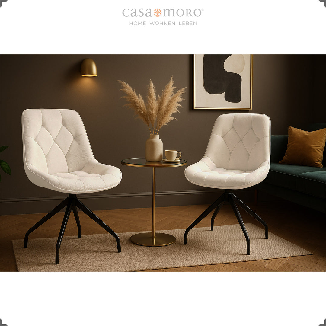 Set of 2 upholstered chairs that can be rotated 360° in beige with a black metal frame - stylish seating group with side table in a modern living room ambience