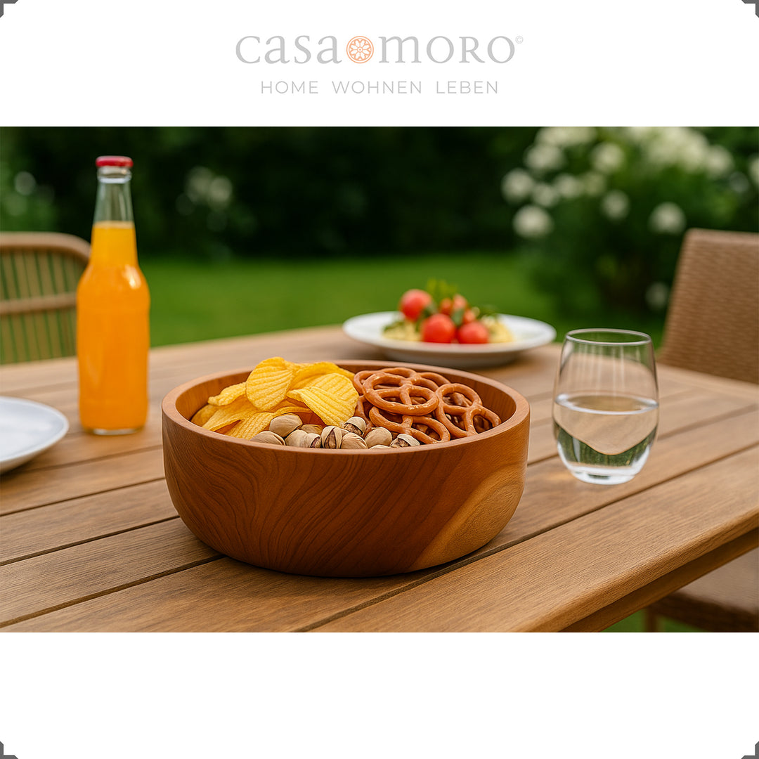 Solid teak serving bowl for snacks on the garden table