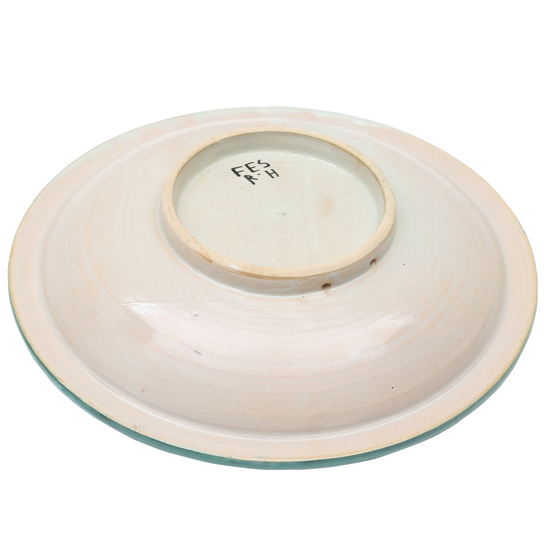 The bottom of the hand-crafted and glazed ceramic bowl from Fès