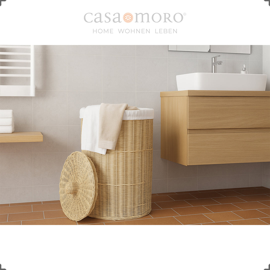 Natural color braided laundry basket with lid decorated with white towel in bathroom