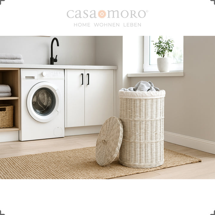 Whitewashed rattan basket with lid and cotton insert in the modern utility room - ideal for bright interiors